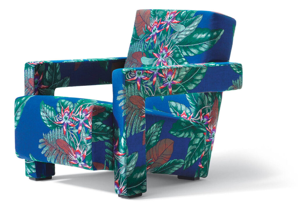 a blue chair with a floral print