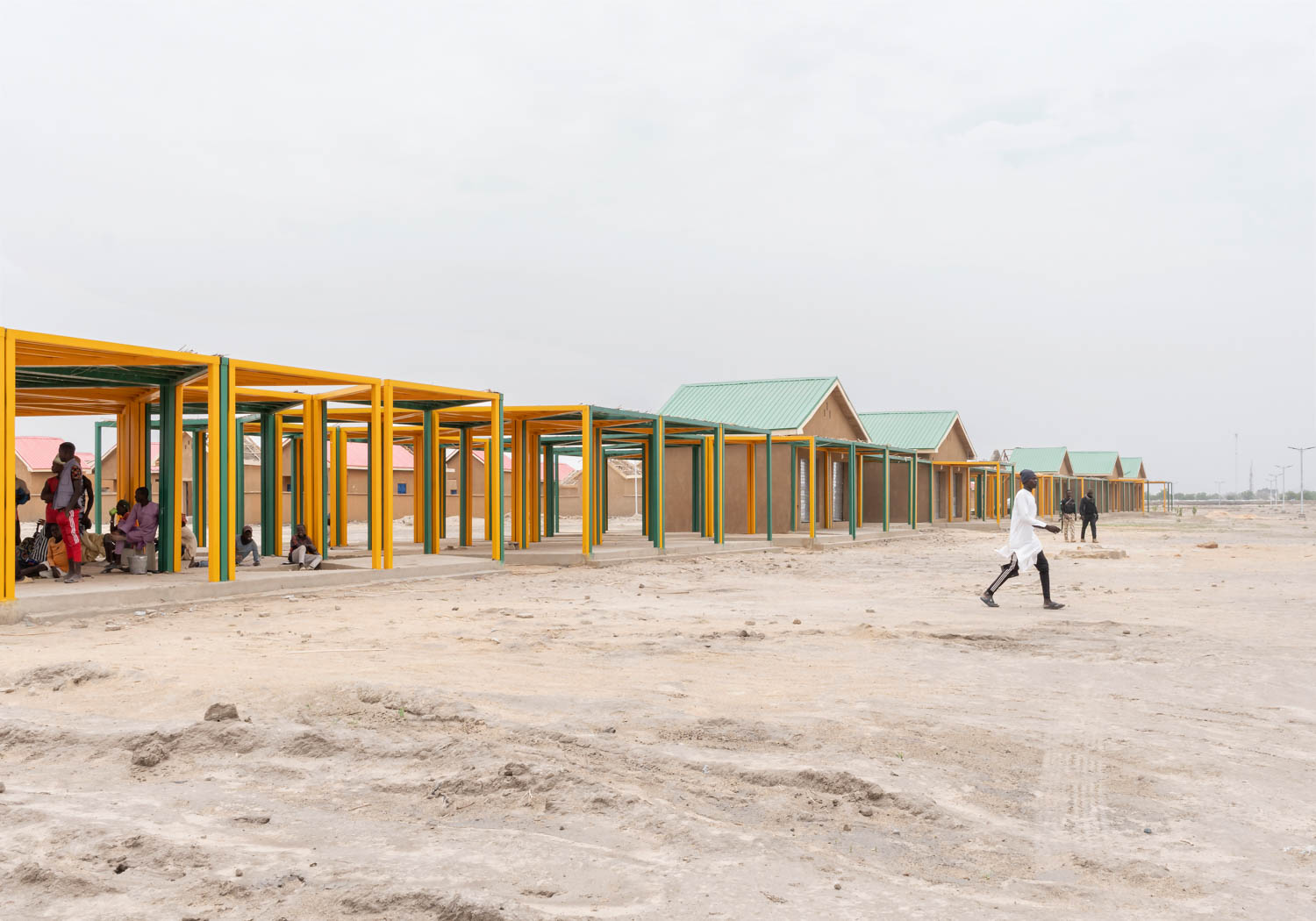 yellow and green structures as part of the Northern Nigerian Village