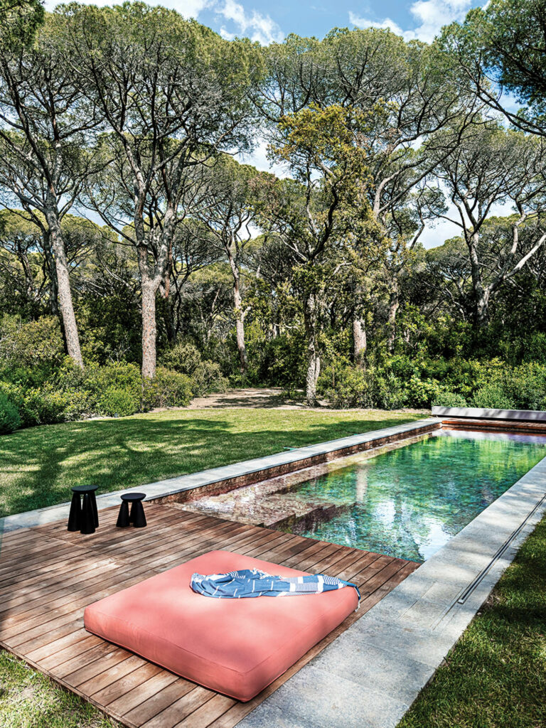 Luserna stone and teak surrounding the pool.