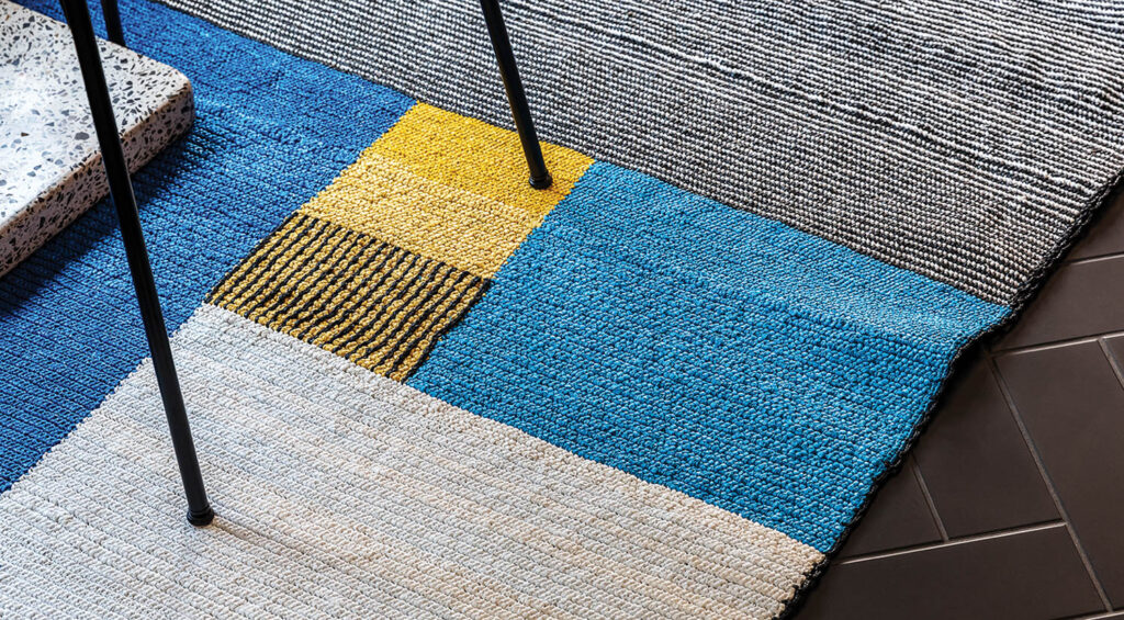 rug with blue and yellow rectangular shapes