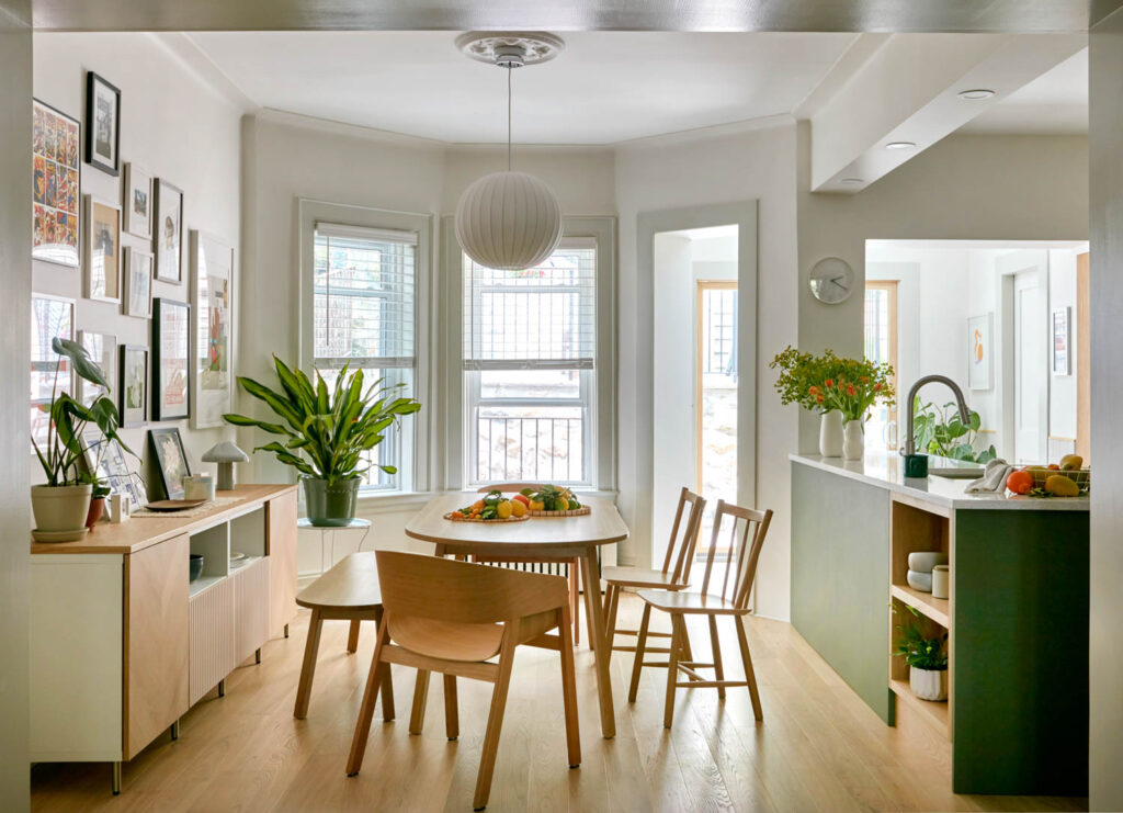 dining area with floor to ceiling windows, wooden dining set and cabinets