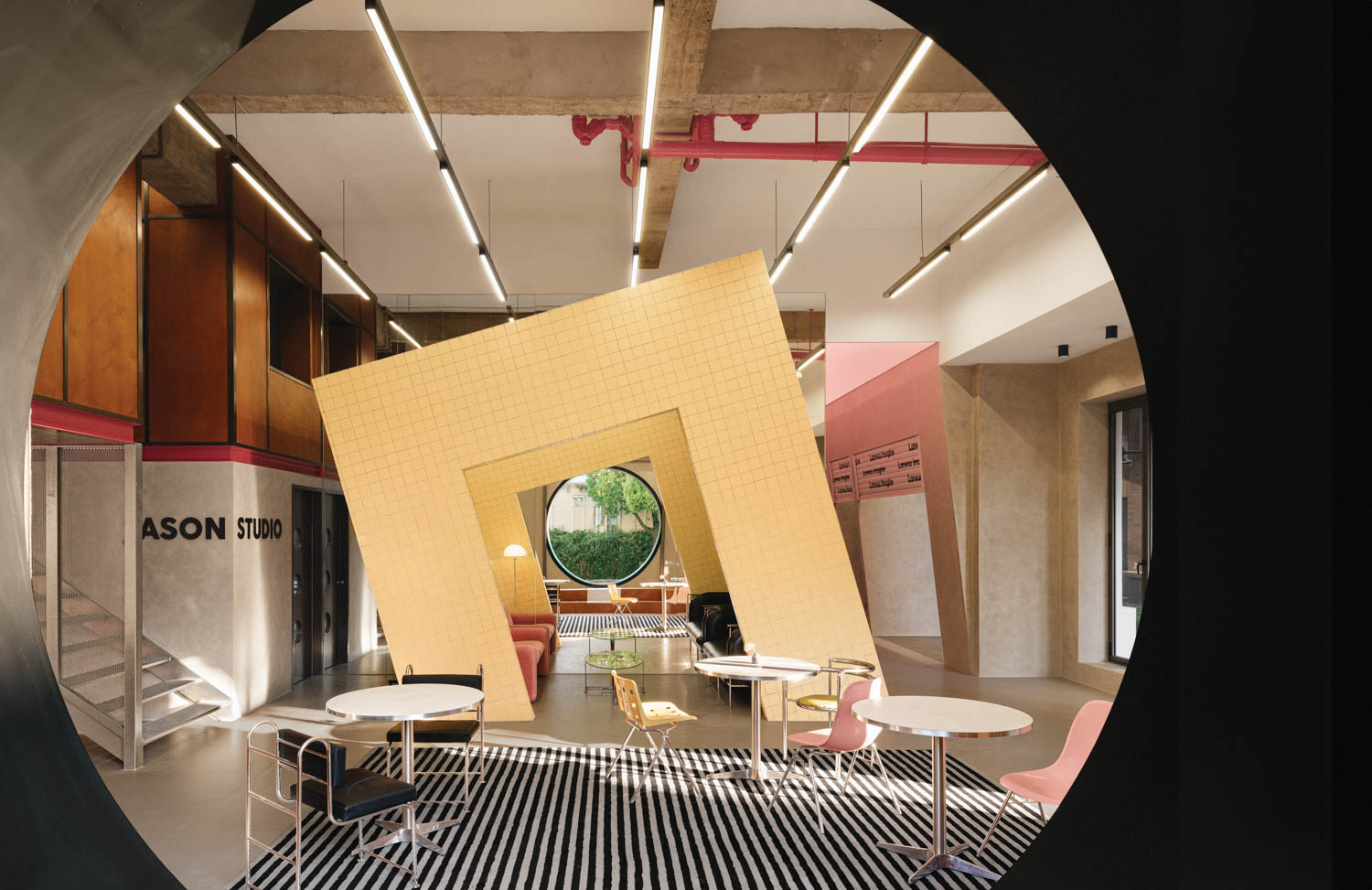 dining area with a circular entryway and geometrical entryways all around