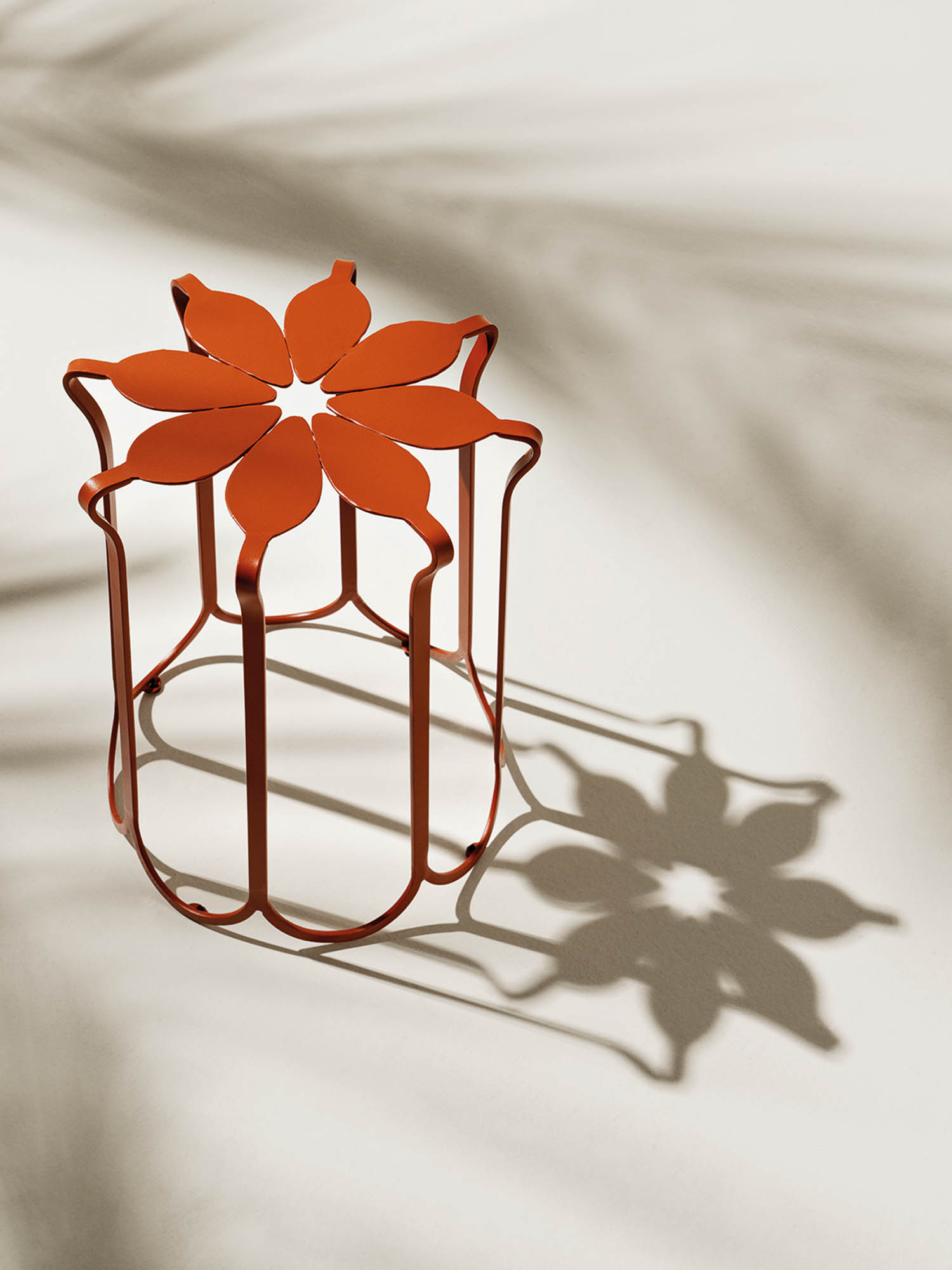 orange stool shaped in the form of a flower