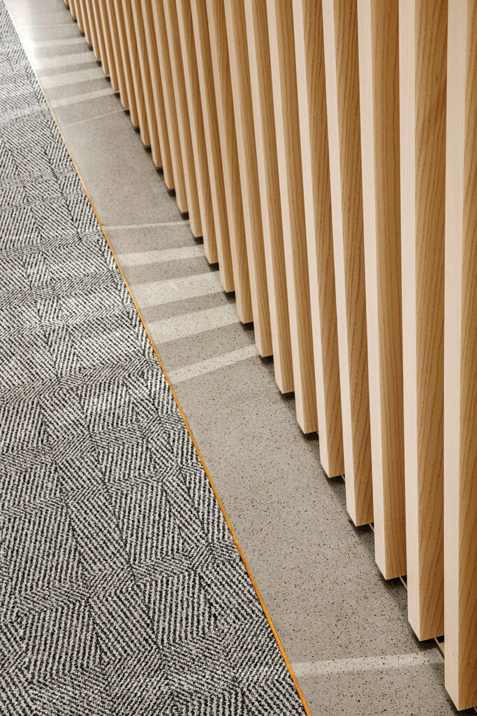 closeup of the carpet tile which is recessed into the concrete floor