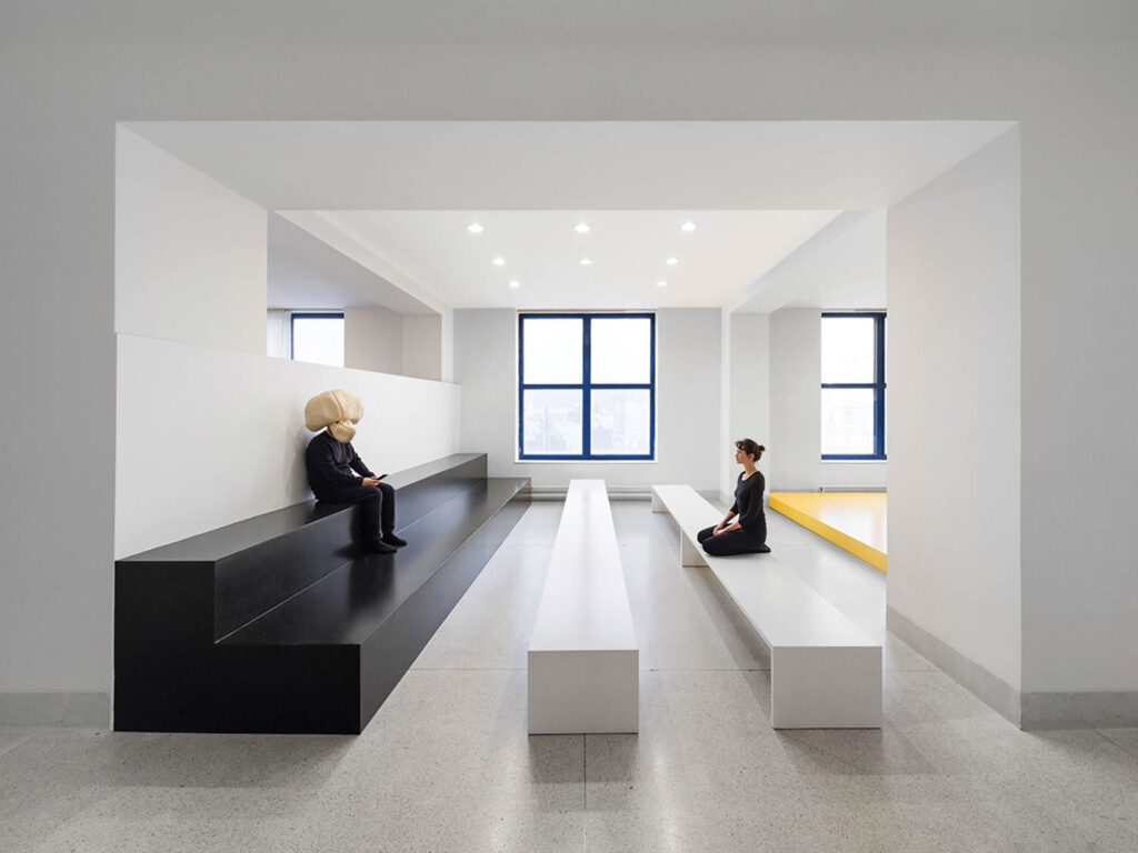 seating area with white and black bleachers