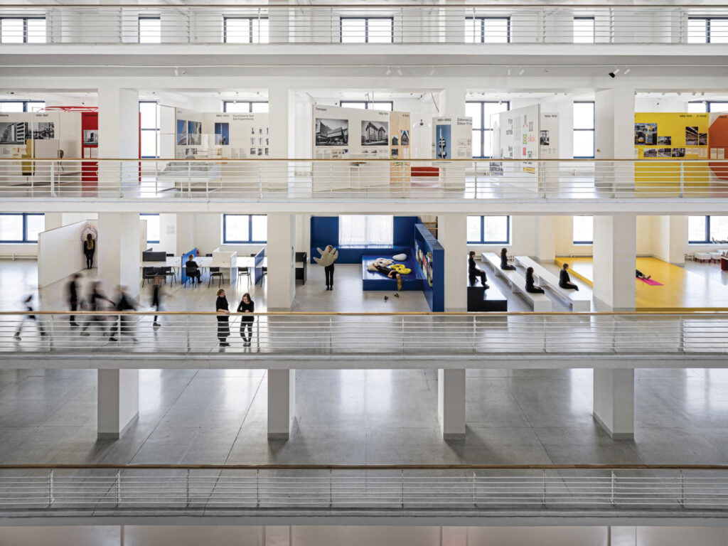 soaring atrium space inside a hall spanning over six floors with open galleries on each