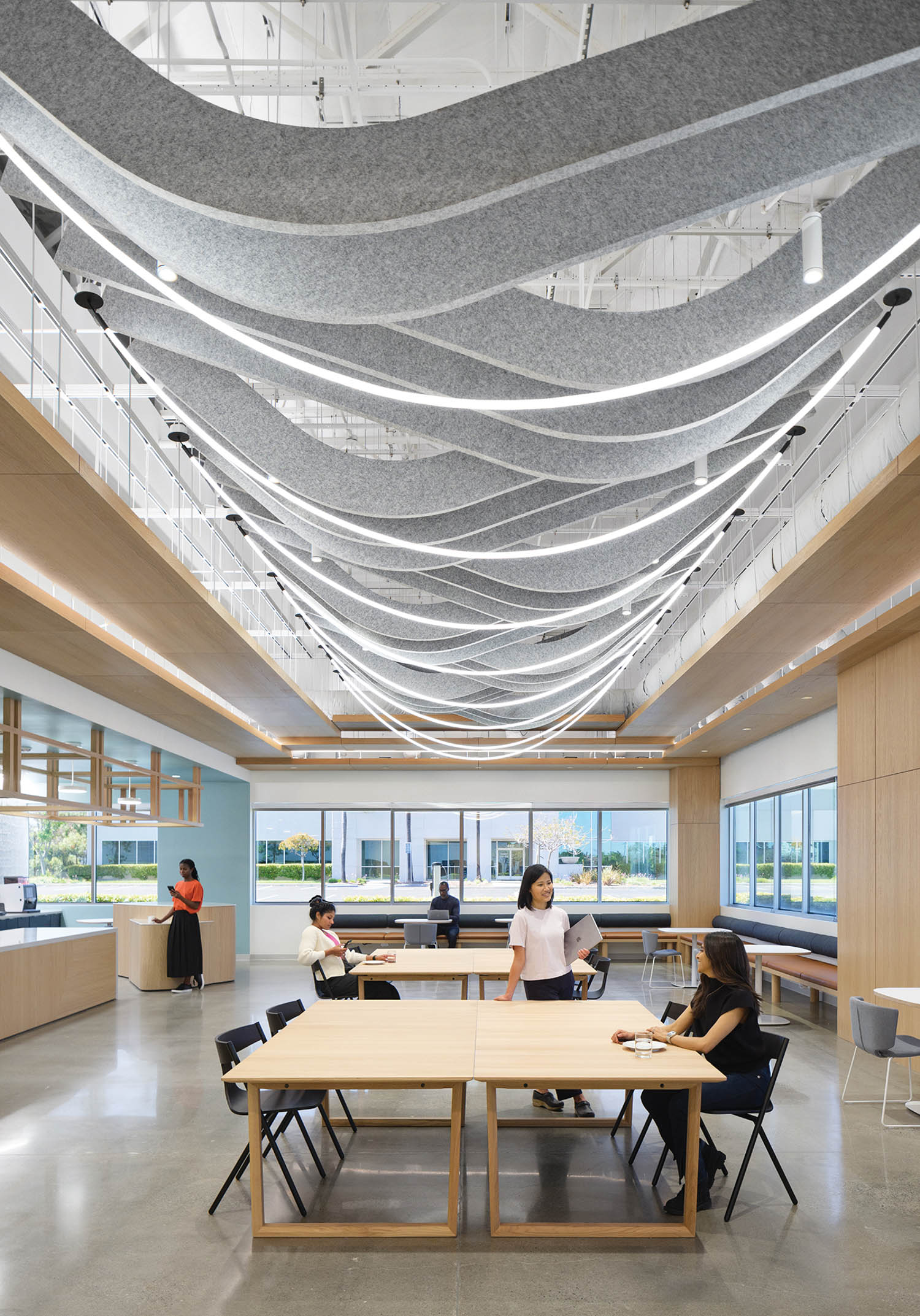 break room with string lanterns and LED ropes on ceiling